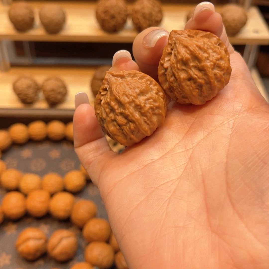 文玩核桃把件桃心流水纹