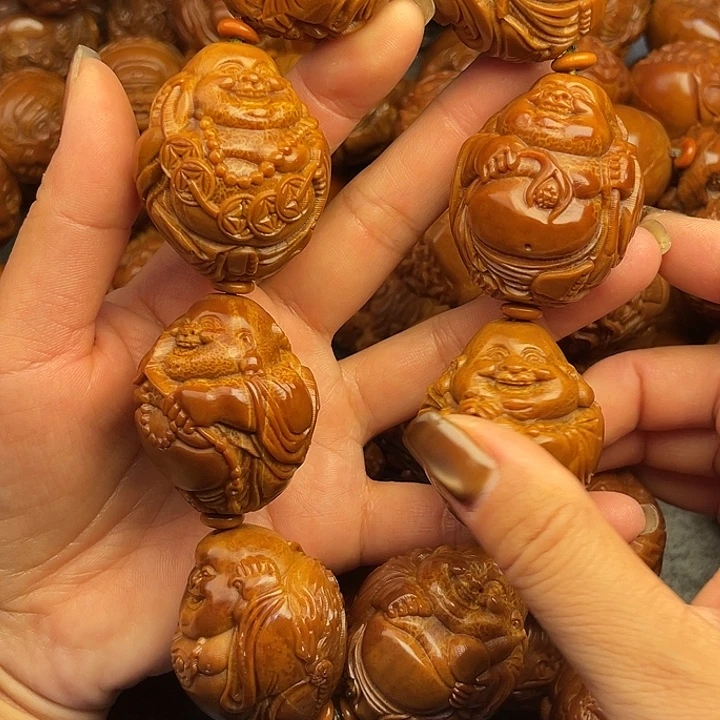 禹***鹏橄榄核吊坠橄榄核手持