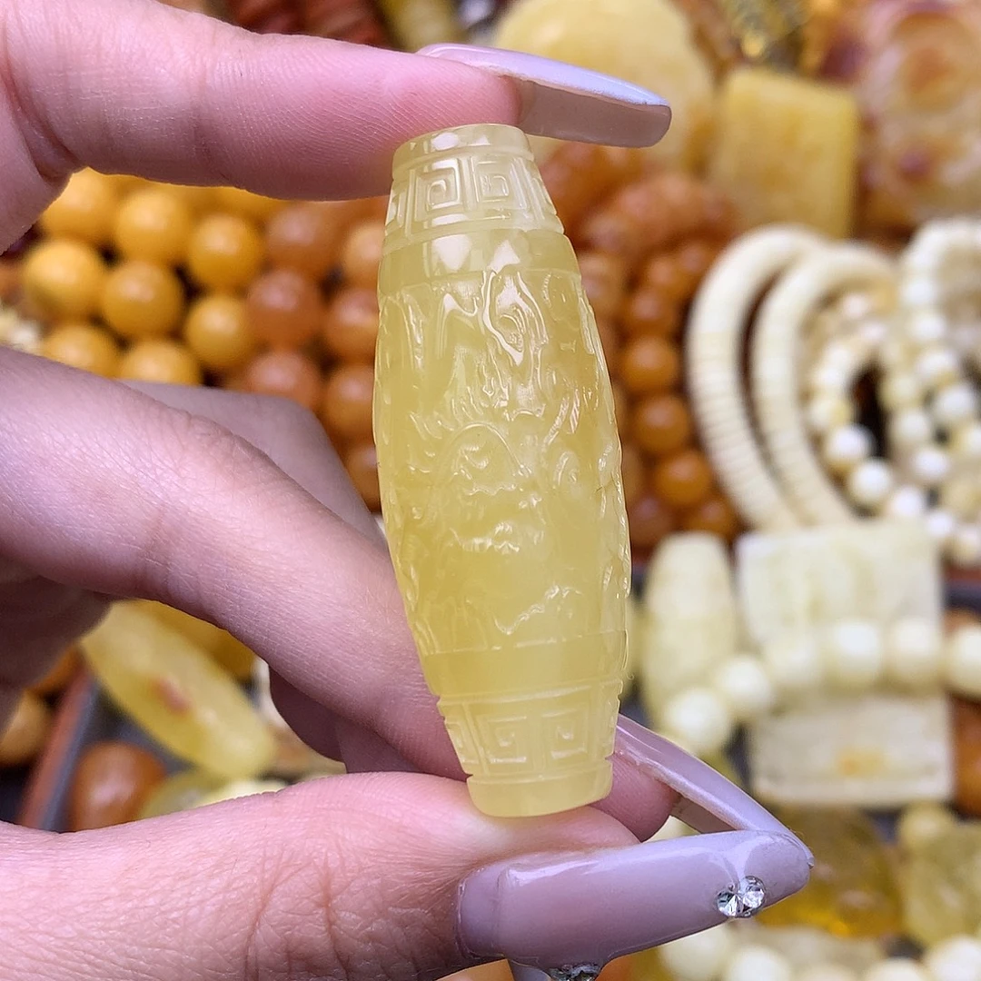 痛***扉琥珀未镶嵌珠宝奇石