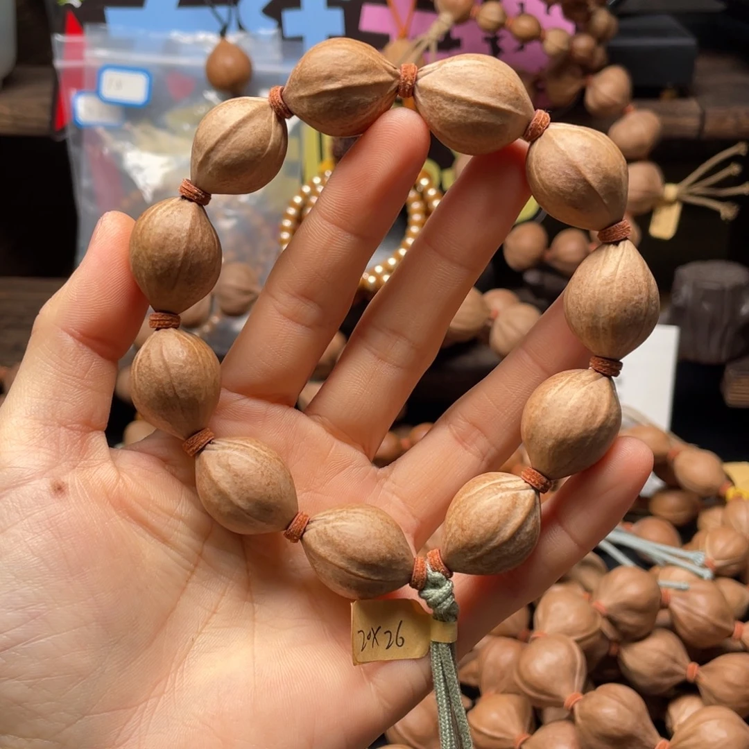 回***料橄榄核吊坠2026老料