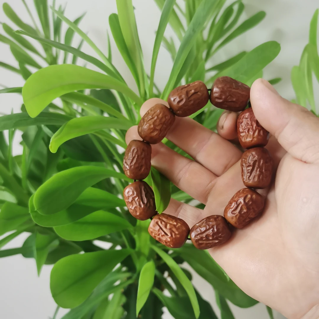 放漏款(百年枣木精雕形手串)
