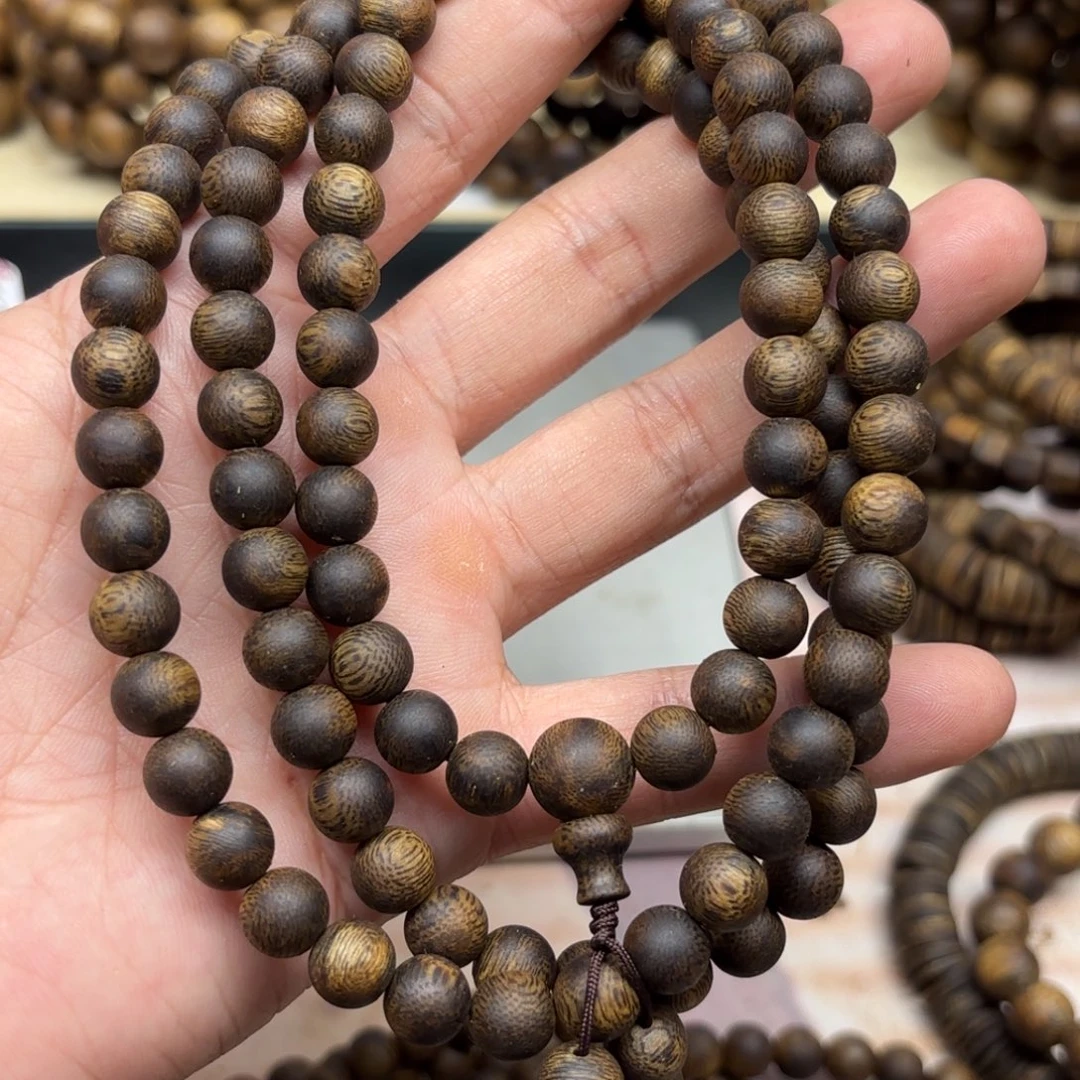 兴***税手串沉香金沙叶卡8多圈28.6克