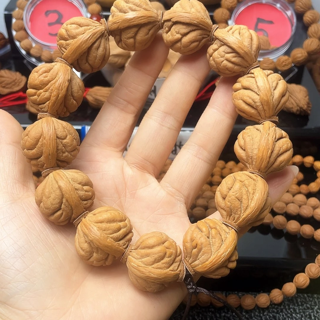 细***刘把件桃核霸王龙手持25➕尺寸13颗