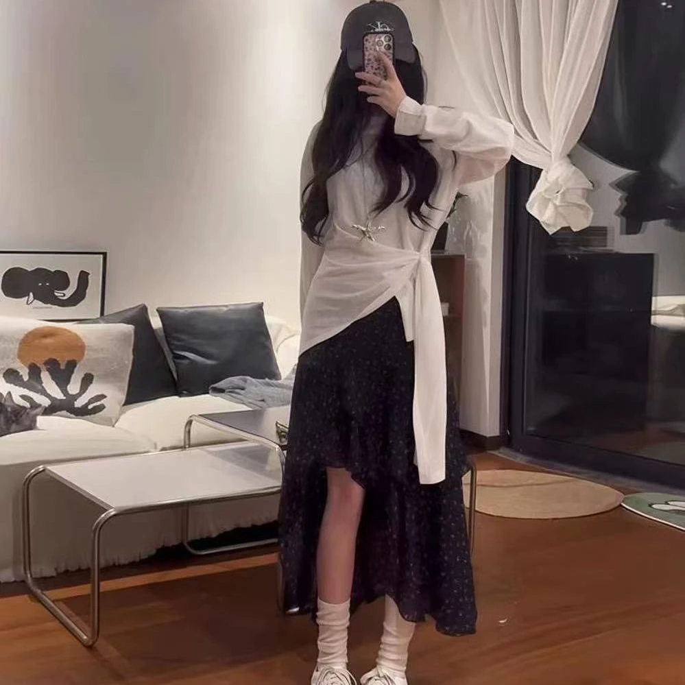 设计感小黑裙度假风长半身裙女夏季高腰A字百搭小众碎花裙温柔