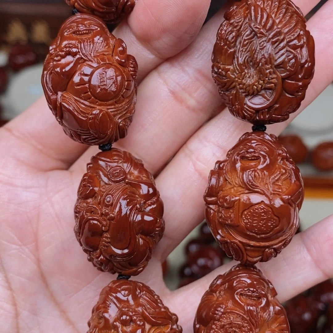 橄榄核吊坠向****赚瑞兽财神