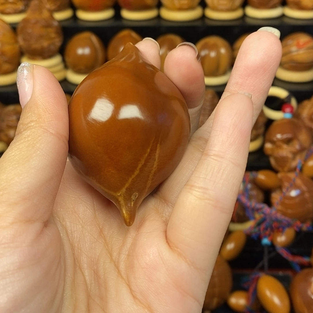 一***人手串/手链橄榄核蝴蝶生命单面000555