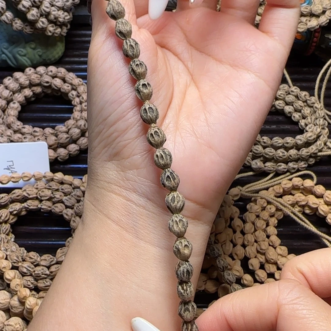 浊***o柏香籽/百香籽吊坠