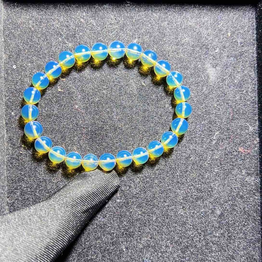 蓝珀珠宝奇石未镶嵌蓝珀异色珀毕业蓝7.6mm净水