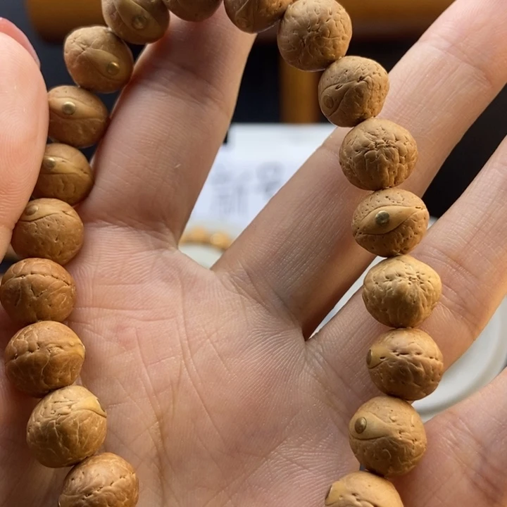 凤眼菩提手串11的一个铜镶嵌