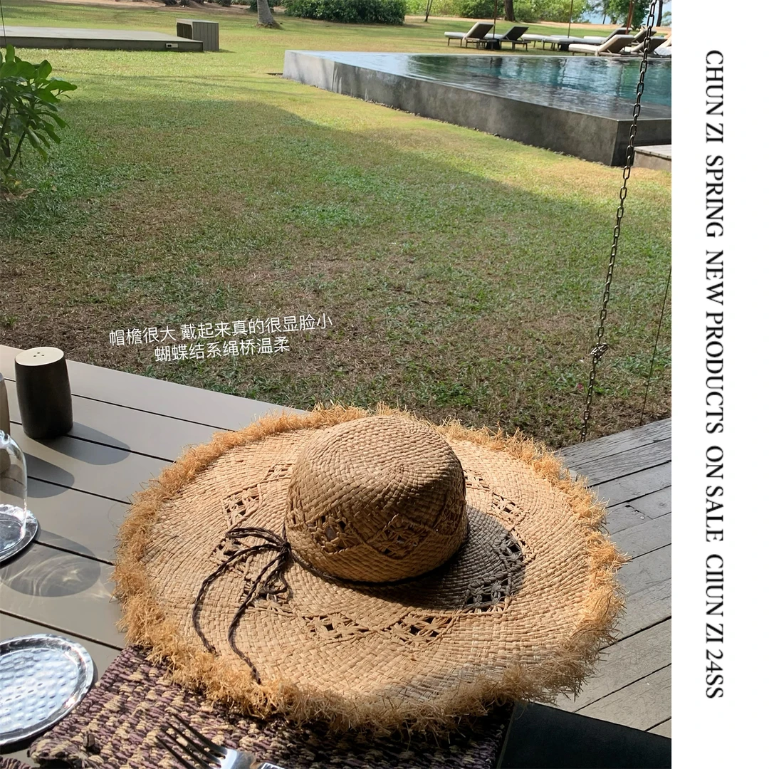 【CHUN ZI】蝴蝶结镂空拉菲草帽夏季大帽檐遮阳帽海边沙滩度假帽子