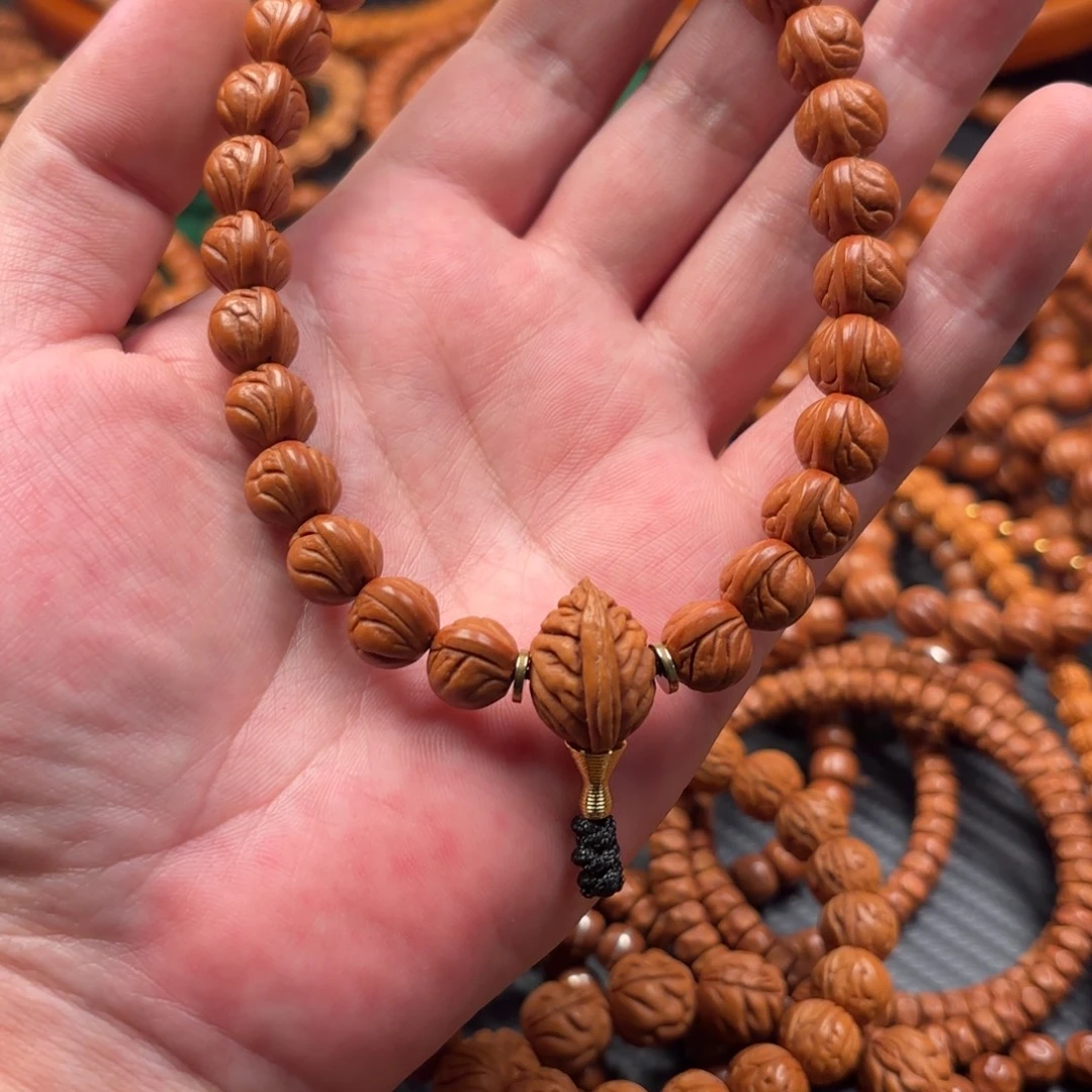 宇***!桃核吊坠玉龙脊手持带佩珠