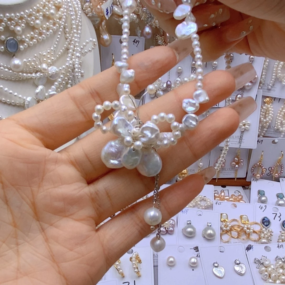 银S925镶嵌淡水珍珠胸饰依***