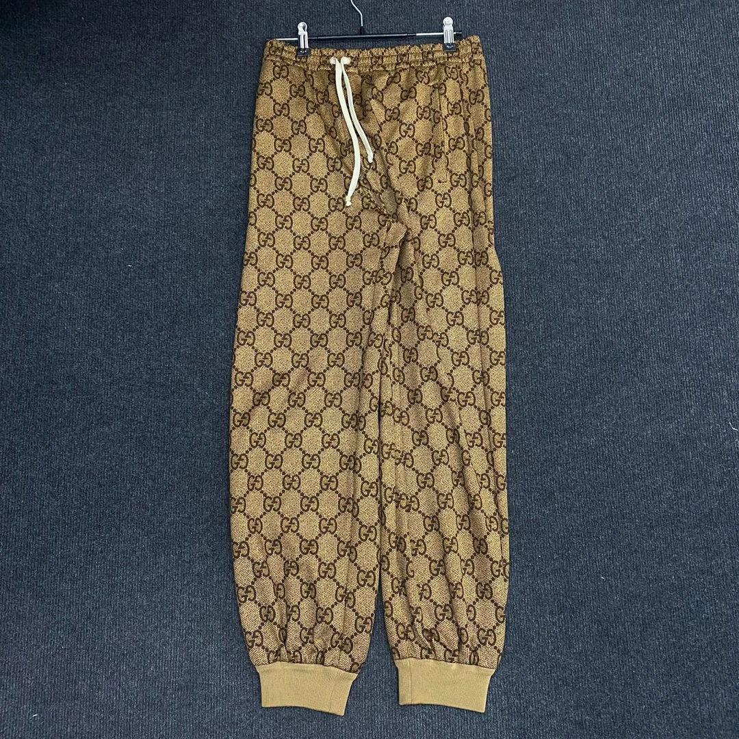 99新 GUCCI/古驰 字母满印束脚休闲运动裤/XS码