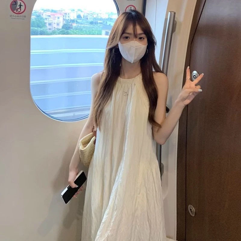 2025夏新款度假风挂脖连衣裙女宽松垂感仙女裙显瘦小心机露肩长