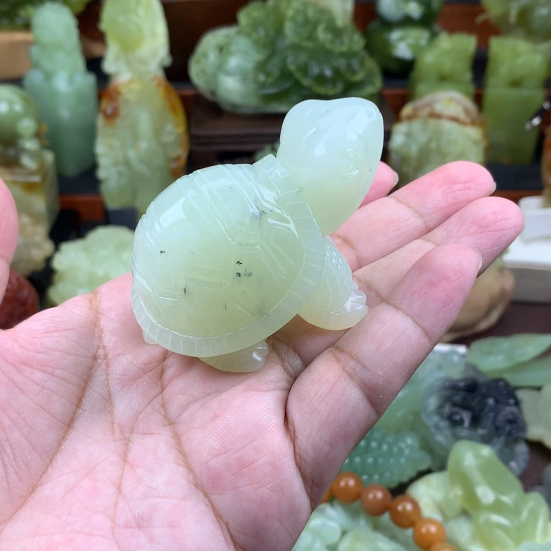 埖***芯未镶嵌岫玉手把件