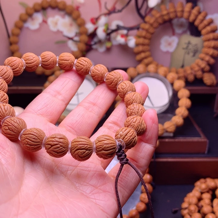 桃核手串仅***动龙纹桃核