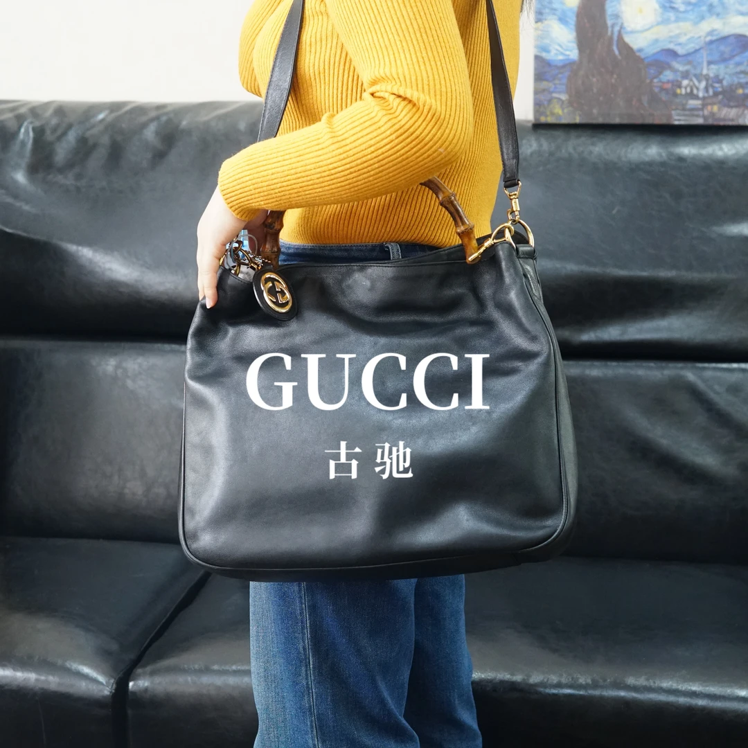 95新 GUCCI/古驰 黑色斜挎包/JJ12411575/1575