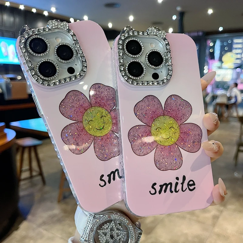 适用苹果系列iPhone16新款手机壳smile笑脸花朵满边钻框闪钻镜头