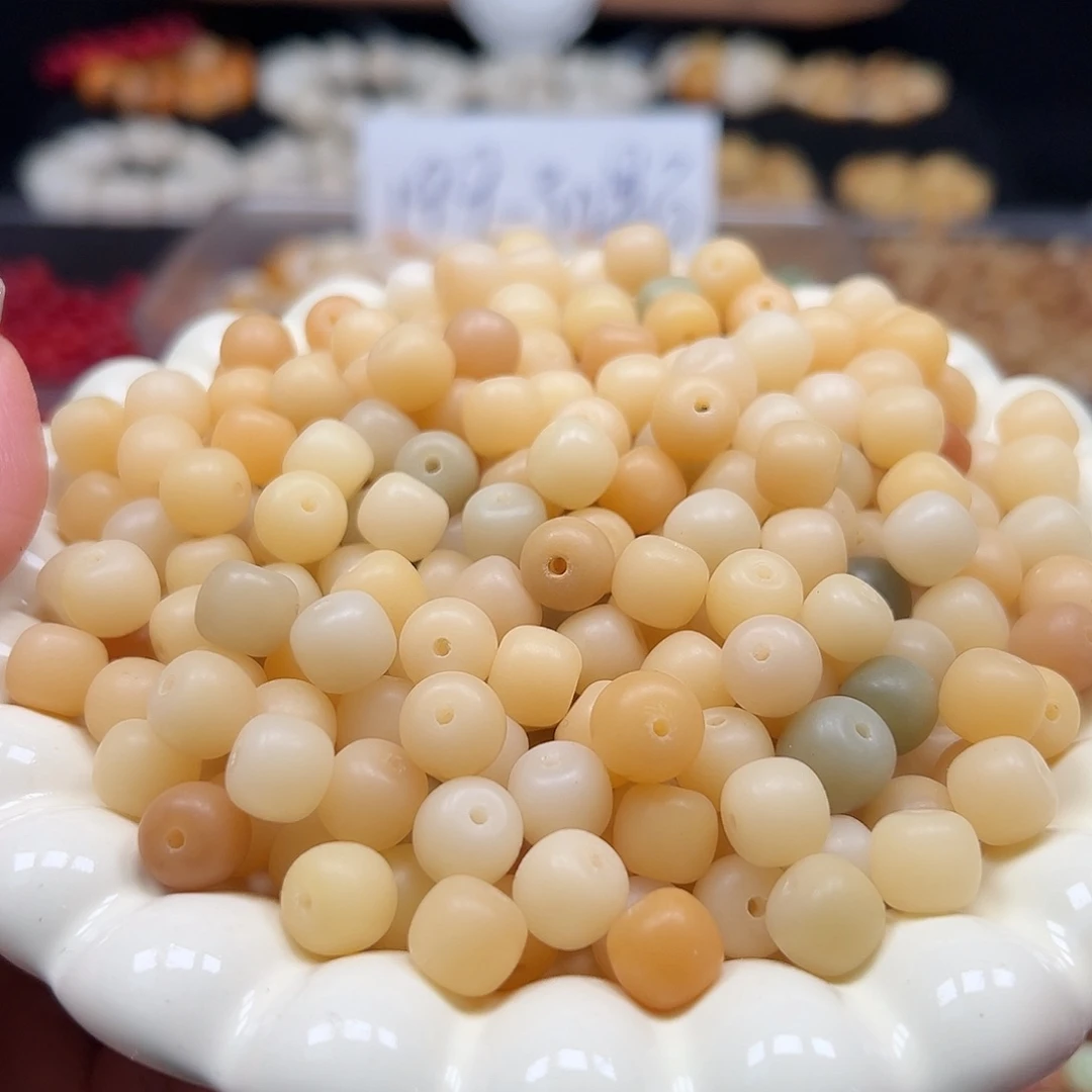 菩提根/象牙果手串微瑕卡10黄桶200颗