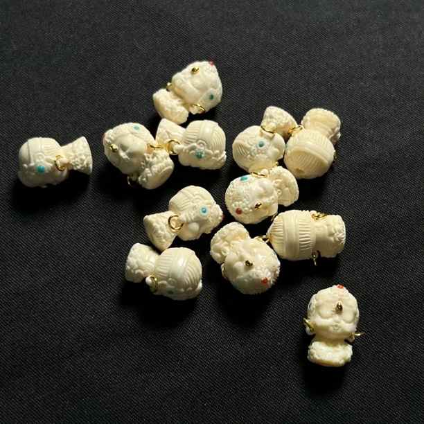 P41405 渡姆约高度15*宽10*厚10*孔道1.5毫米只做天然猛犸牙