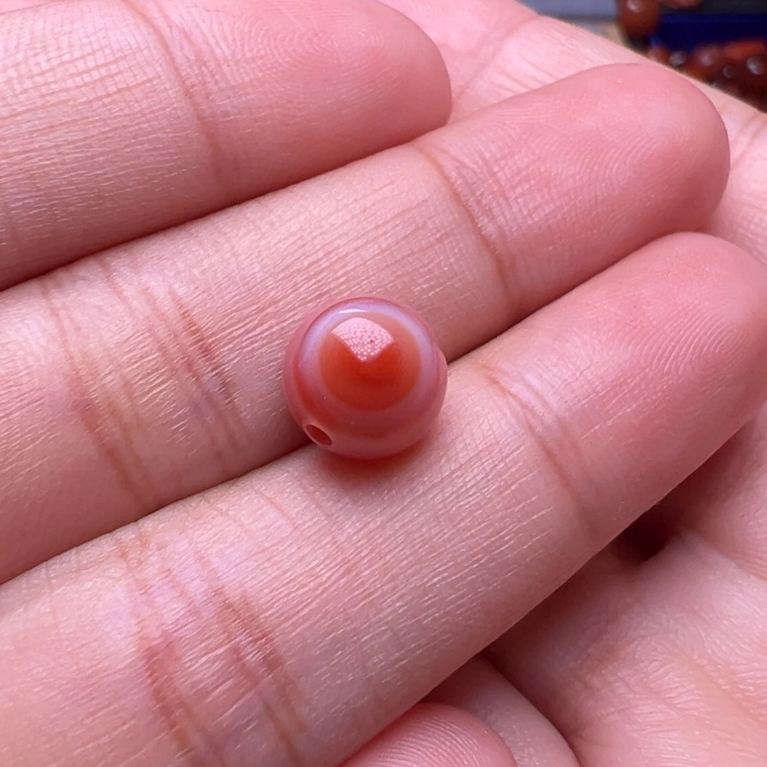 南红玛瑙未镶嵌珠宝奇石特色带眼圆珠9.3