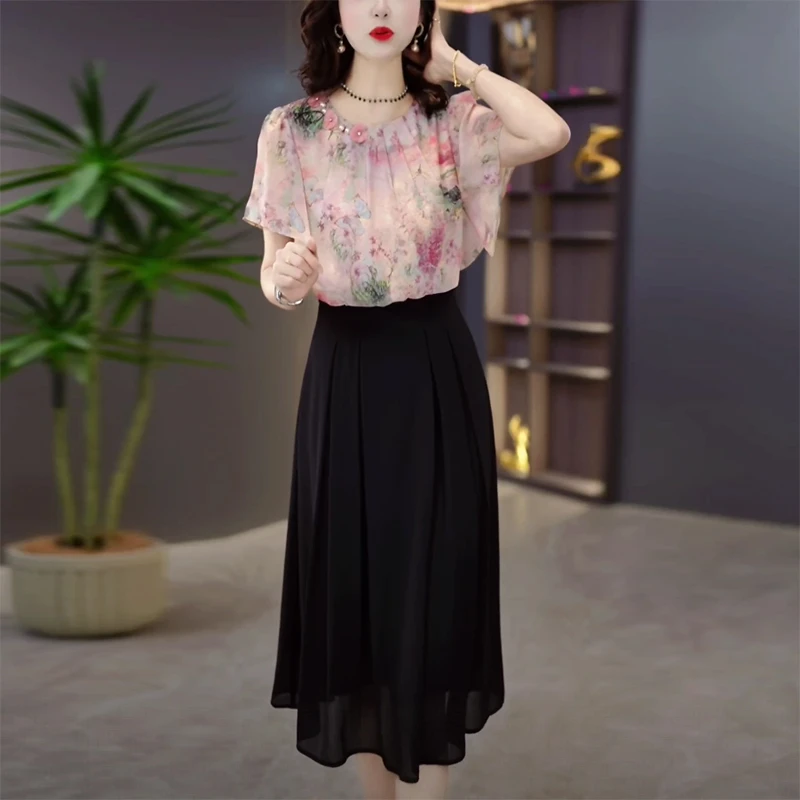 2025夏季时尚洋气减龄印花拼接显瘦修身洋气大气高级感收腰连衣裙