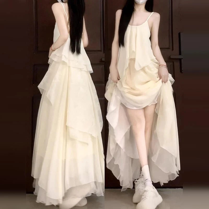 高级感法式白色吊带连衣裙子女装夏季2026新款海边度假不规则长裙
