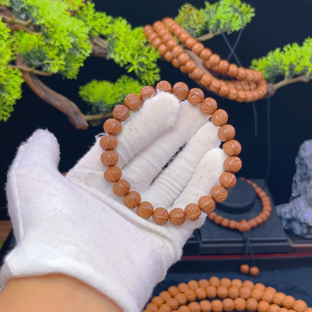 哈***哈吊坠桃核野生桃核