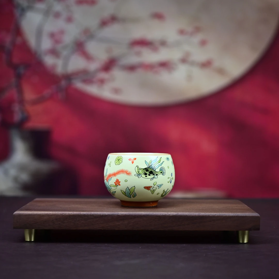 1S罗汉杯香远鱼趣铜钱底主人杯 A44