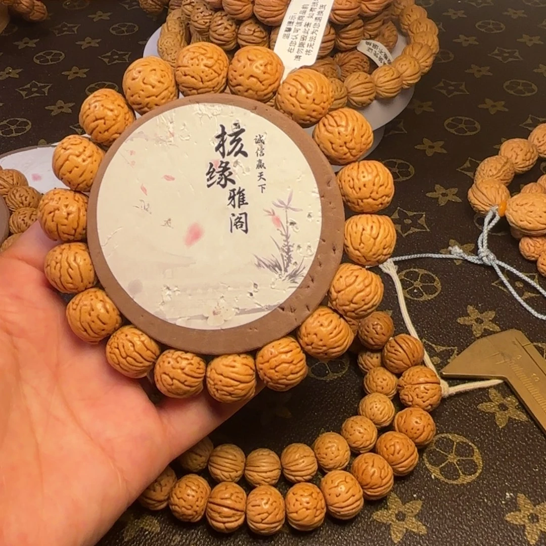 辉***呀桃核手串肉纹元宝小金豆