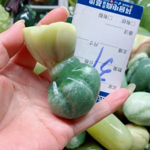 糖***宝蛇纹石玉未镶嵌手把件