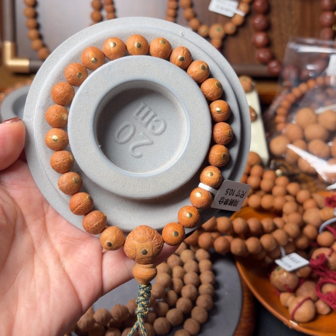 用***3凤眼菩提手串同树镶嵌铜钉