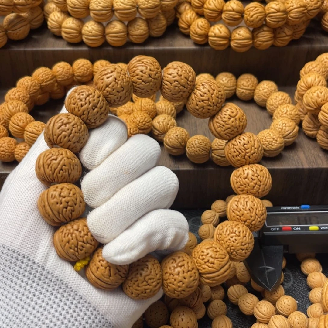 桃核手串阿****?老树苹果