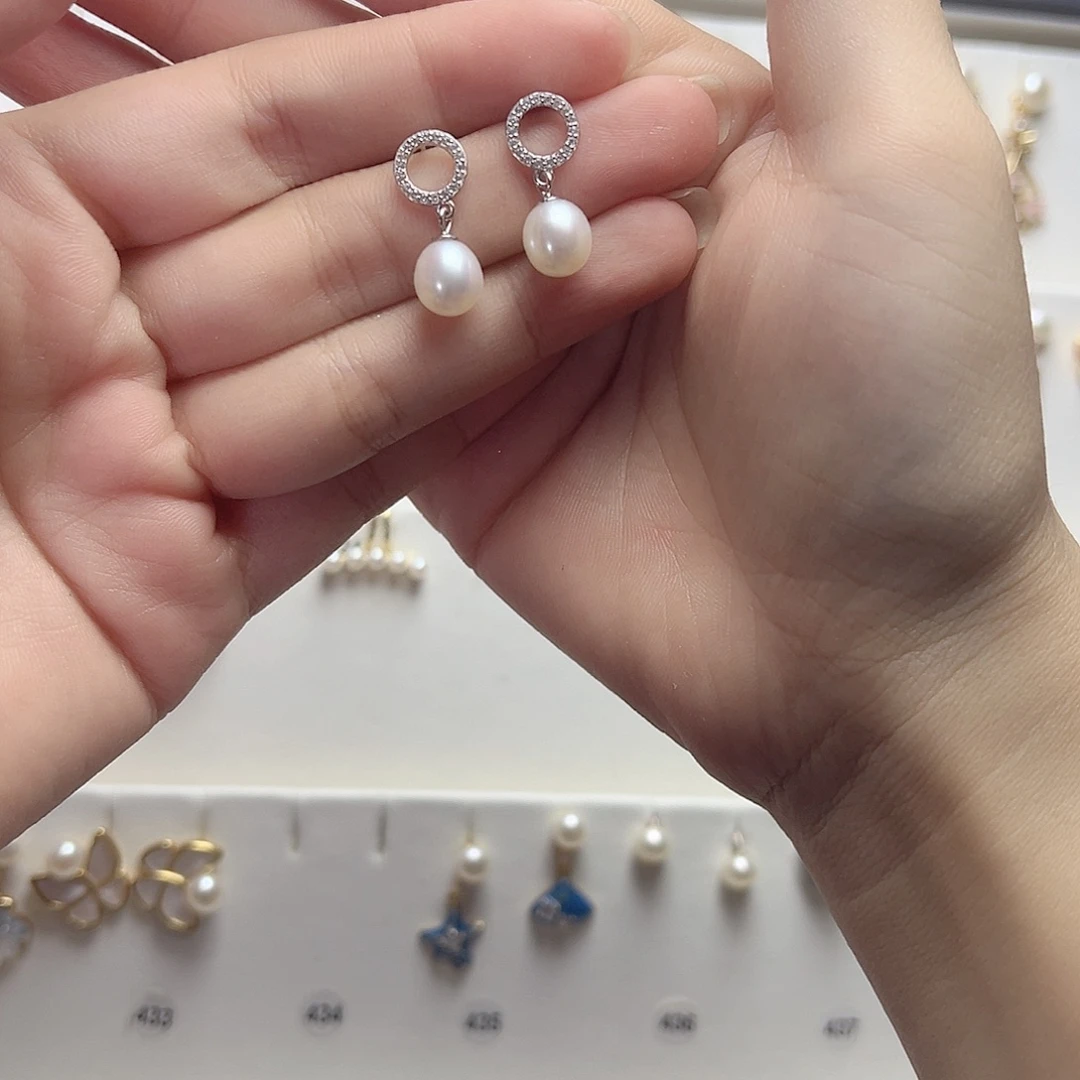 小***林银S925镶嵌耳饰淡水珍珠