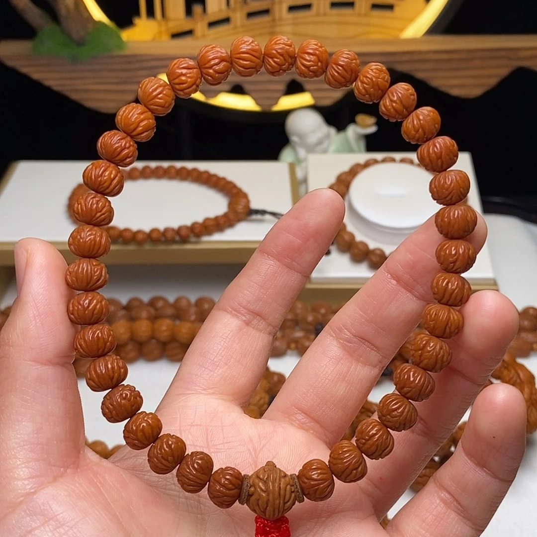 海***风桃核手串9mm野生凤羽聚宝盆桃核手持36颗