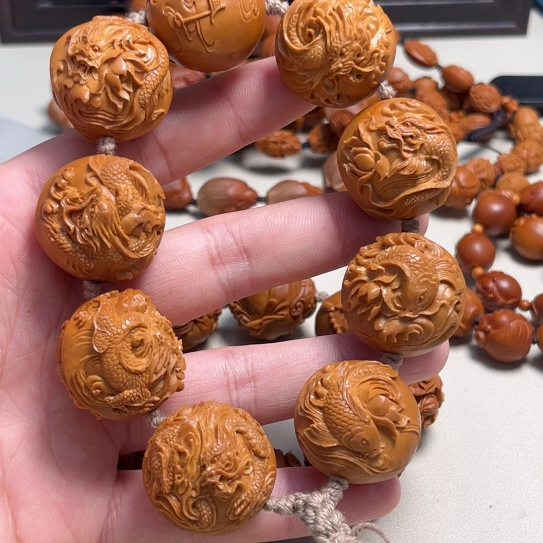 橄榄核吊坠高****帽鱼跃龙门