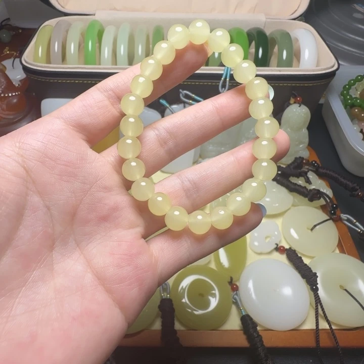 新疆老料蜂蜜水圆珠手串