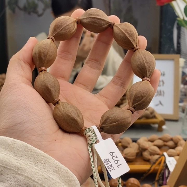 吊坠橄榄核土*丝梅林铁