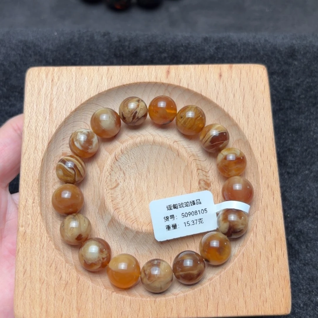 琥珀未镶嵌珠宝奇石12mm甜橙猪油溶洞
