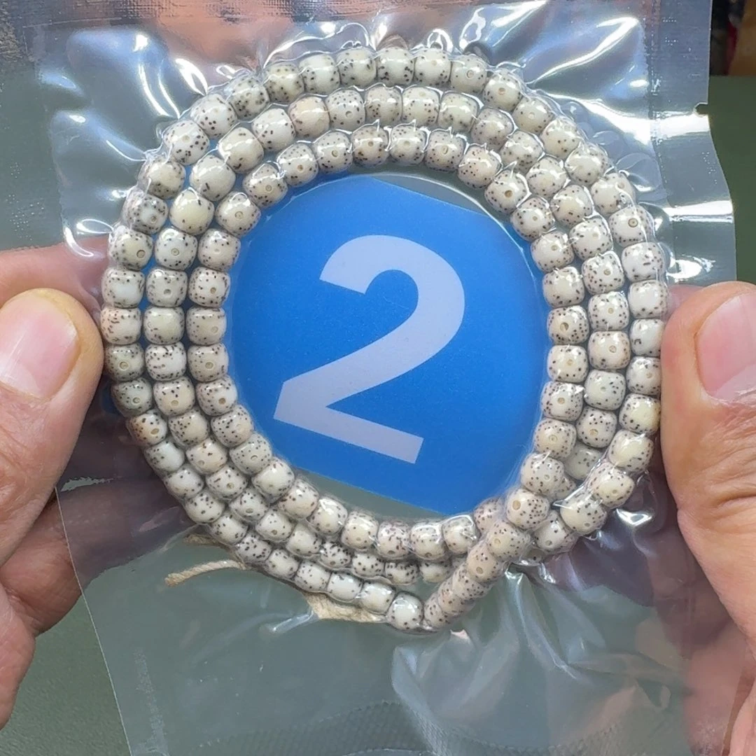 菩提根/象牙果吊坠76石玉108。2