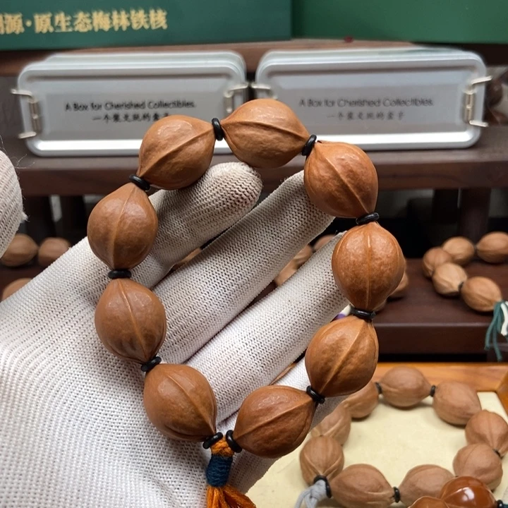 昊***。手串橄榄核1926三花