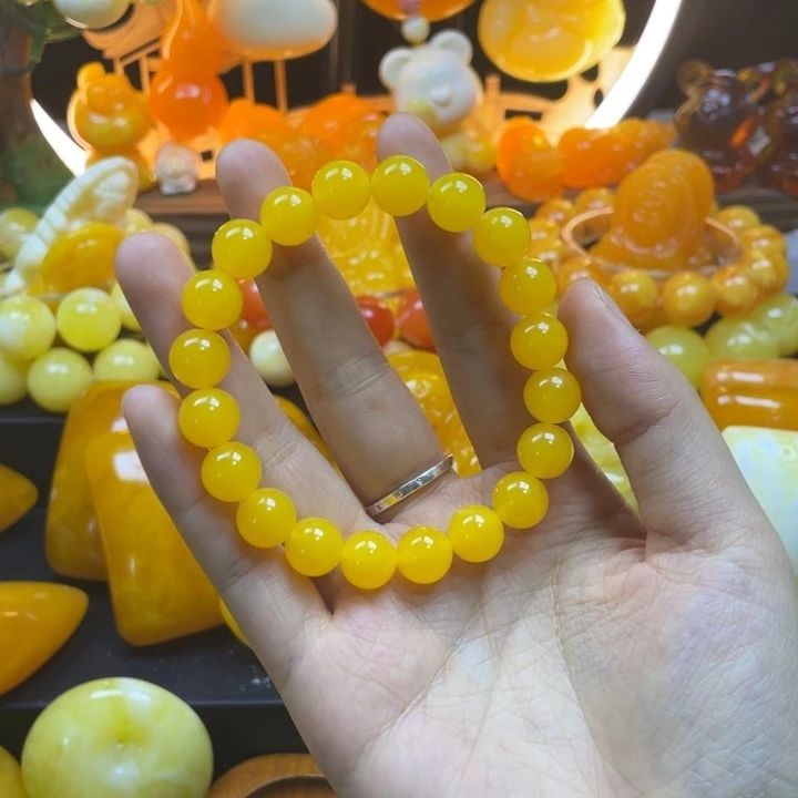 小***敏非金属全品无瑕鸡油黄手串