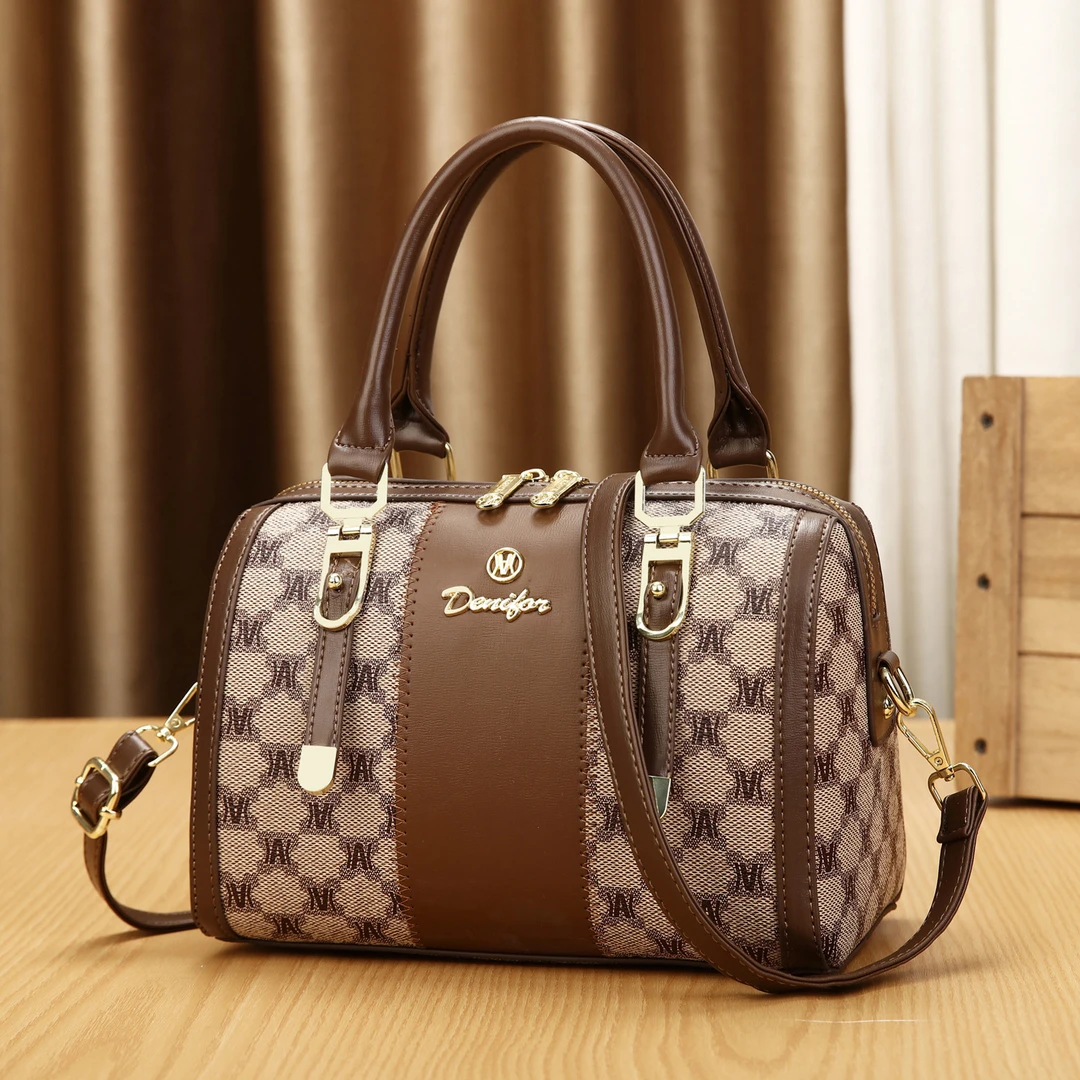 纪诗哲包包女士2025新款波士顿枕头包时尚潮流拼色印花单肩斜跨包