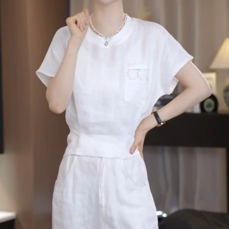 2025新款时尚简约纯色洋气百搭镂空收腰显瘦短袖上衣LK2503126