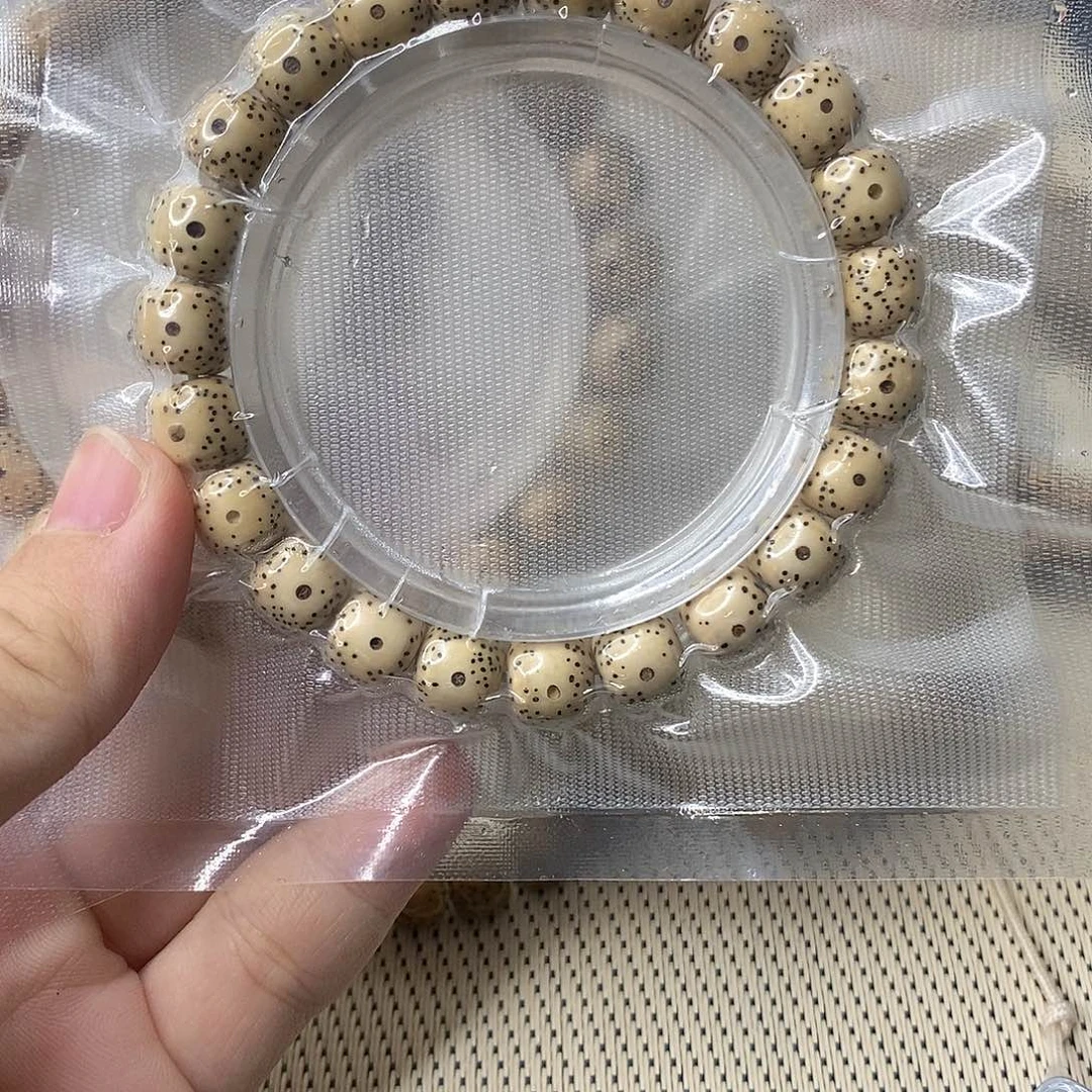 星月菩提吊坠鸡油黄大眼单圈109