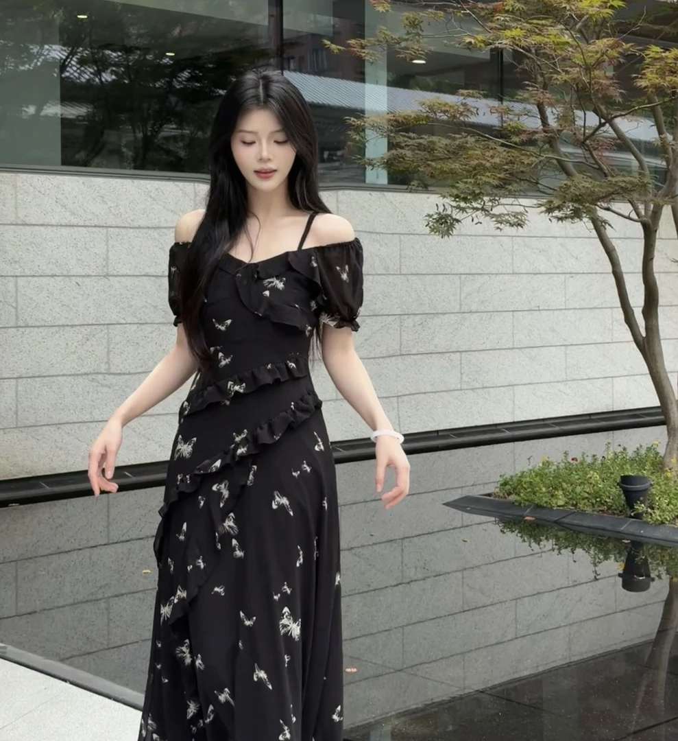 法式度假风吊带连衣裙夏季蝴蝶碎花掐腰显瘦不规则印花设计感长裙