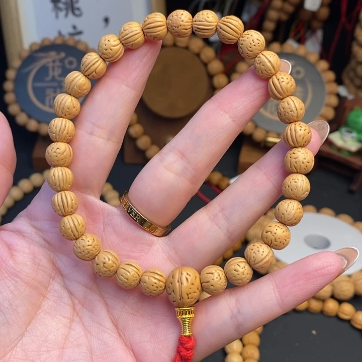 桃核手串奶油三道筋边尺9抛光尺寸误差0.5mm之间