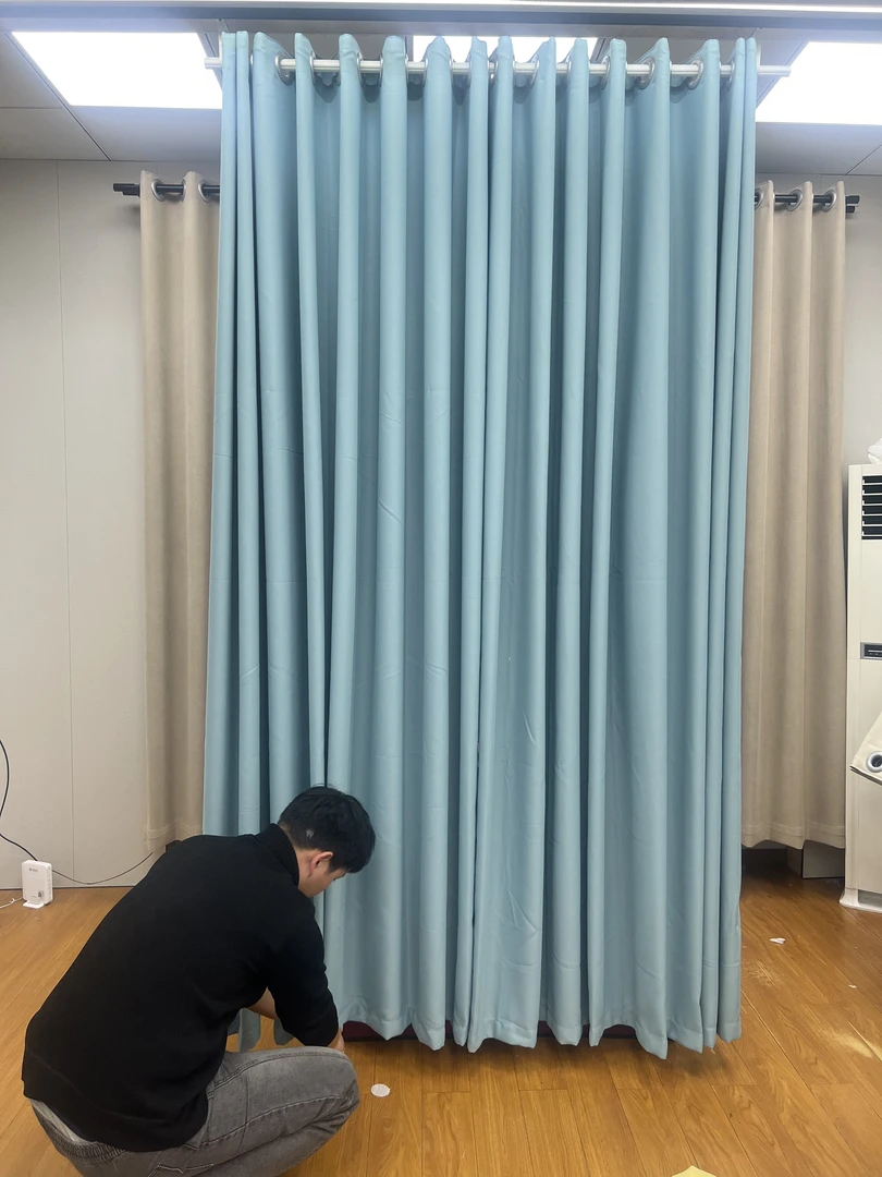 布一家晴天蓝色纯色简约加厚客厅现代成品对开窗帘