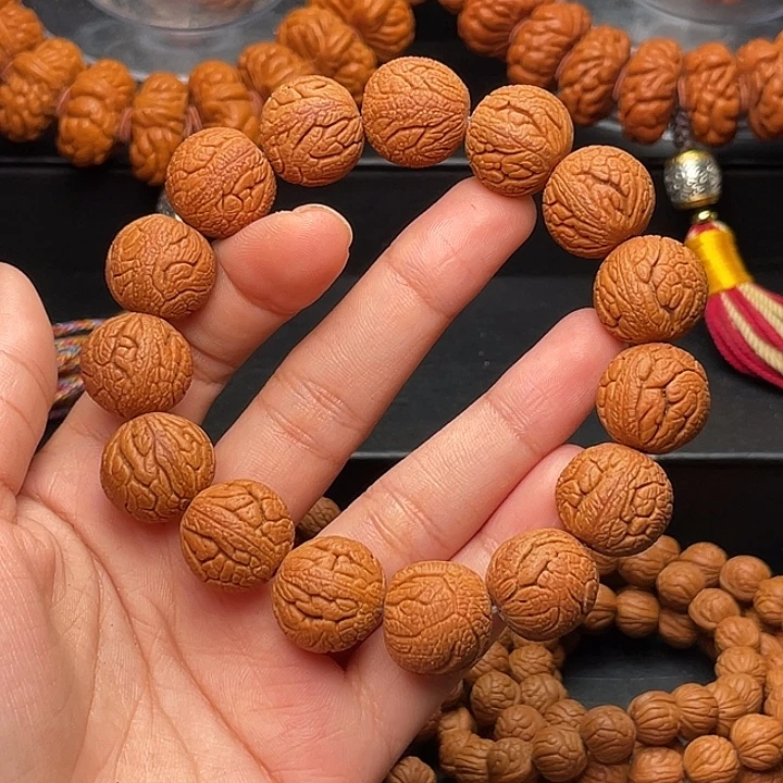 手串桃核金丝龙珠1.6