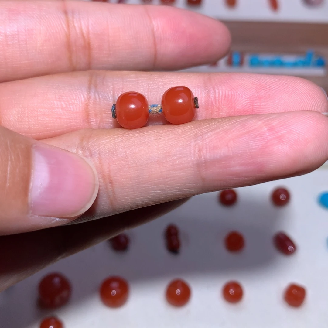 钮***洋南红玛瑙未镶嵌保山玫红老型对珠7.4×6.4